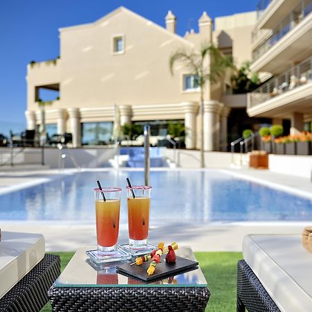 Отель Vincci Seleccion Aleysa Бенальмадена Экстерьер фото The pool at the hotel